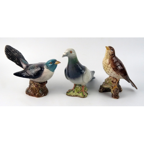 1382 - Three Beswick pottery bird ornaments including Pigeon, Thrush and Cuckoo.