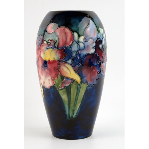 1388 - A Moorcroft pottery vase frill and slipper orchid vase, circa 1945, signed WM, 18cm high.