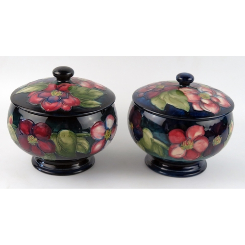 1389 - A pair of Moorcroft pottery bowls and cover with 