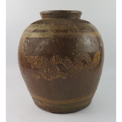 1419 - A Chinese pottery storage jar of Martaban style, decorated with a dragon and incised decoration to t... 