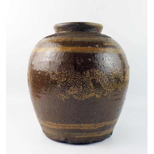 1419 - A Chinese pottery storage jar of Martaban style, decorated with a dragon and incised decoration to t... 