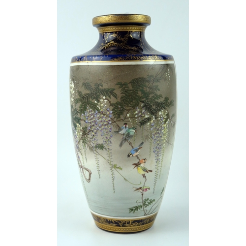 1424 - A Japanese Satsuma vase, one panel decorated with finches amongst wisteria, the other panel with a c... 