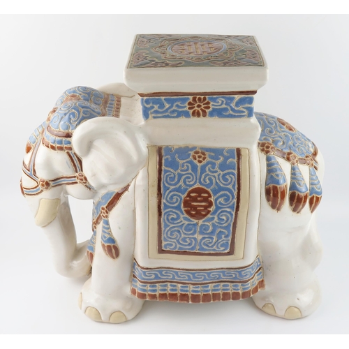 1437 - A large modern Chinese pottery jardinière stand in the form of elephant, with polychrome decoration,... 