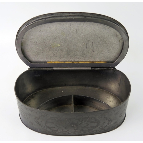 1439 - A Chinese pewter oval box, with hinged lid enclosing a compartments interior, with floral decoration... 