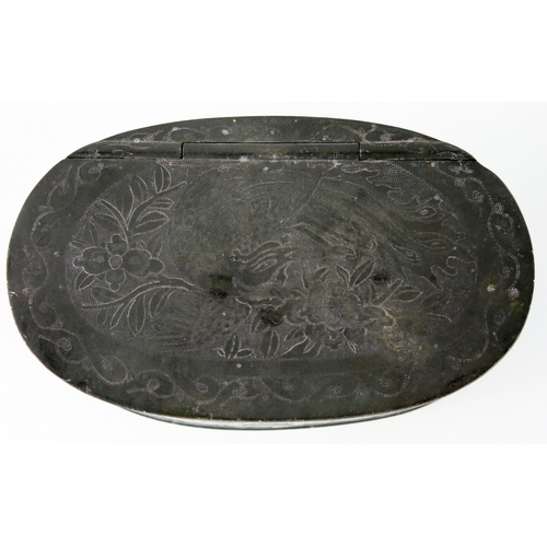 1439 - A Chinese pewter oval box, with hinged lid enclosing a compartments interior, with floral decoration... 