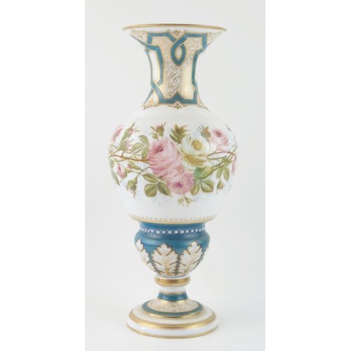 1483 - A late Victorian white glass vase of ovoid form, with flared rim, decorated with briar roses, on a k... 