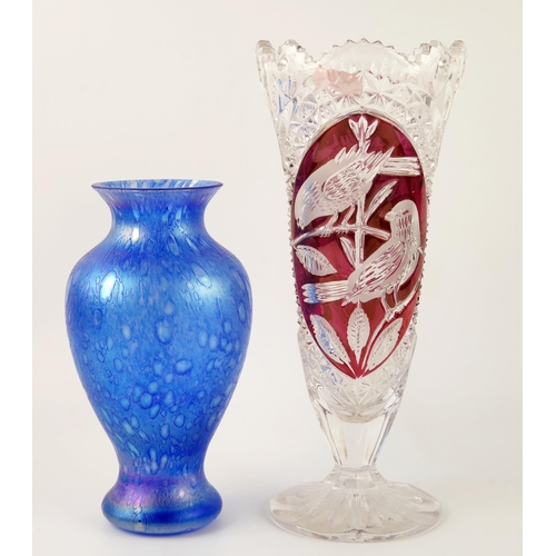 1486 - A Heron glass vase of ovoid form with flared rim with blue opalescent bubble decoration, 19cm high. ... 