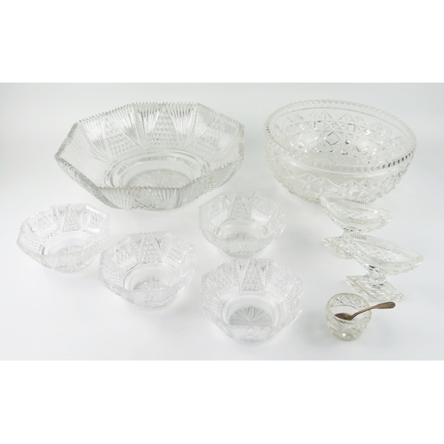 1488 - A pair of clear glass pedestal salts, two glass fruit bowls and sundae dishes.