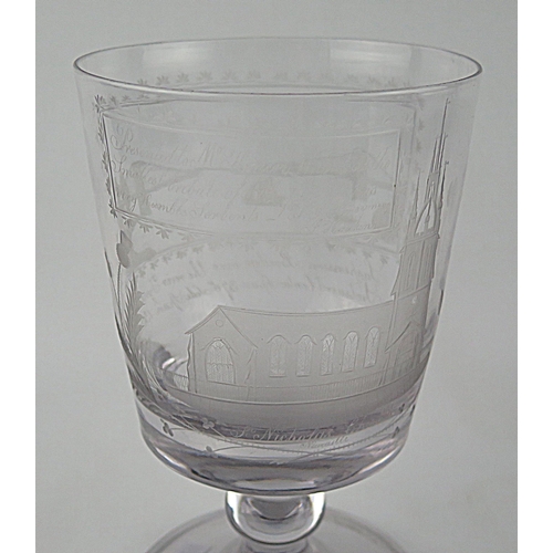 1492 - A 19th century large lead glass rummer, with etched decoration of the suspension bridge over the riv... 