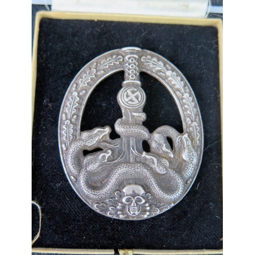 1532 - A replica Third Reich period Anti-Partisan Badge, contained in a fitted case.