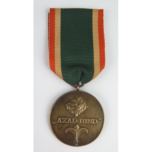 1534 - A Third Reich period Azad Hind Shaid-e-Bharat medal with ribbon.