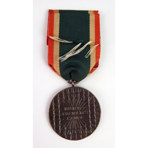 1534 - A Third Reich period Azad Hind Shaid-e-Bharat medal with ribbon.