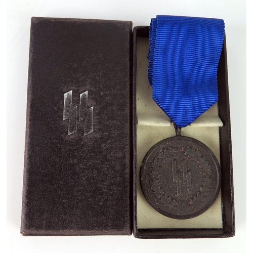 1535 - A third Reich period SS four-year service medal, with ribbon, and box.