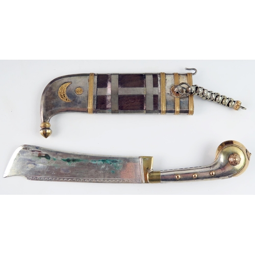 1541 - An Indo-Persian dagger with single edge blade, white metal and gilt decorated pistol grip, contained... 