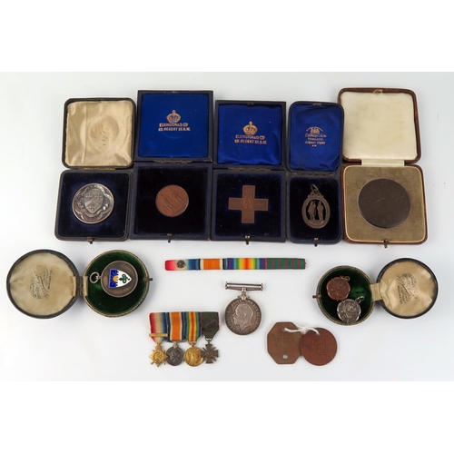 1551A - A World War One War Medal to Captain. R. EILLS, a group of four WWI miniatures, assorted silver, bro... 