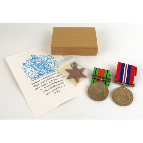 1552 - A World War II , includes Burma Star, War and Defence medals.