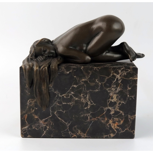 1564 - After Adolf Pohl, a bronze study of a kneeling female nude, mounted on a rectangular marble base, si... 