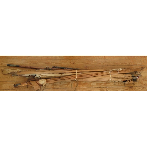 1589 - A collection of assorted greenheart and bamboo fishing rods including boat rods, salmon rods etc.