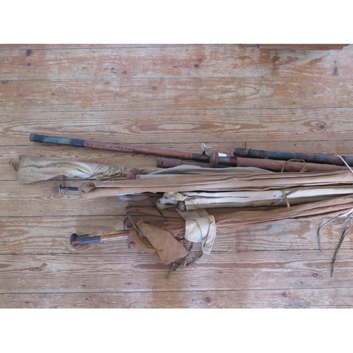 1589 - A collection of assorted greenheart and bamboo fishing rods including boat rods, salmon rods etc.