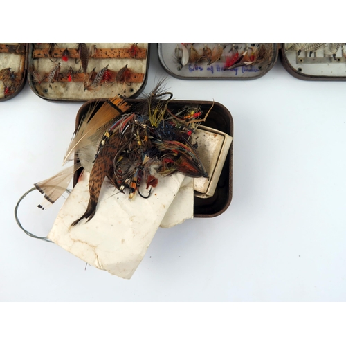 1594 - A collection of assorted salmon, sea  trout ant trout flies, contained in fly boxes and loose.