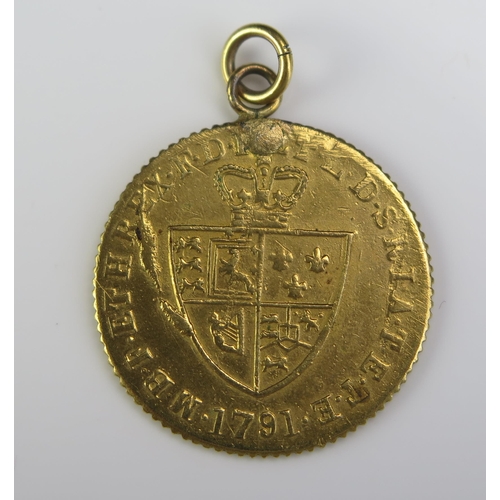 160 - A George III 1791 Gold Coin, c. 26.6mm diameter, 4.5g. Drilled, filled and with pendant mount **WITH... 