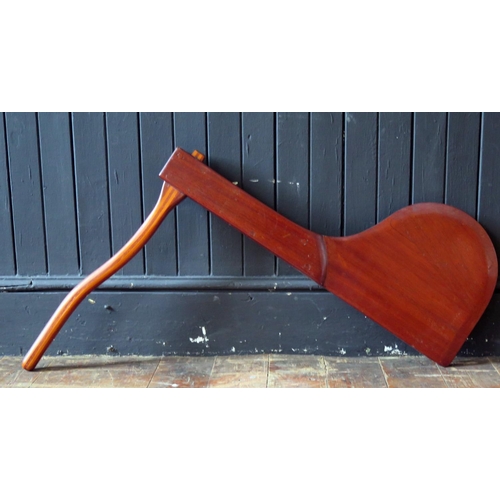 1606 - A polished mahogany dingy rudder with laminated tiller. 71cm high.