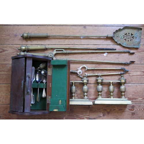 1615 - A pair of brass fire dogs, brass fire implements and a cutlery box