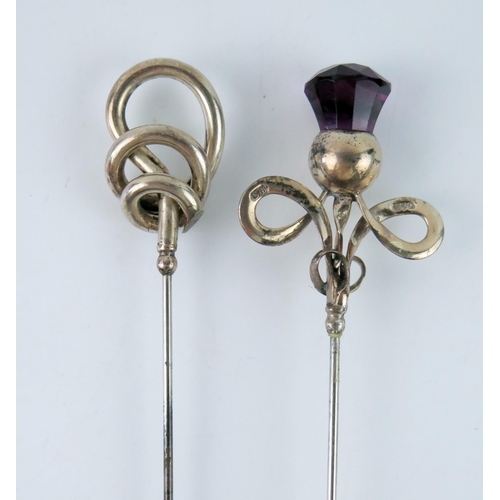 1620 - An Edwardian silver hatpin, maker Charles Horner, Chester, 1907 of swirled design, together with ano... 