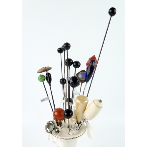 1625 - A mixed collection of assorted pat hat pins, with agate terminals, button terminals, and shell termi... 