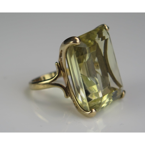 163 - A 9ct Gold and Citrine Dress Ring, c. 25.5x21.5x12mm stone, size O.5, 18.3g