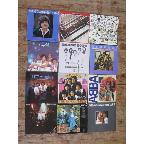 1630 - An extensive collection of 33rpm records, artists include, Led Zeppelin, The Beatles, Abba, Slade, D... 