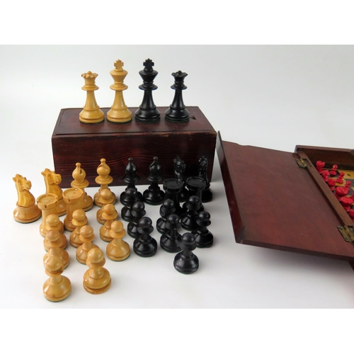 1652 - A travelling chess set, with natural and stained red bone chess pieces contained in a mahogany foldi... 