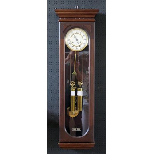 1656 - A mahogany Vienna style wall clock, with 18cm Roman dial, , the movement with bitalic pendulum, over... 