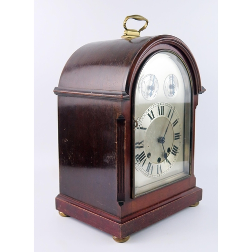 1659 - A mahogany cased director's style bracket clock, with arched silvered Roman dial with regulation and... 