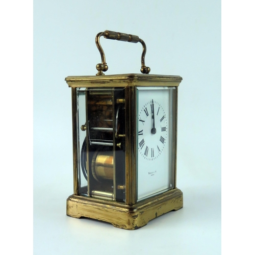 1666 - A French brass carriage clock, the movement with lever platform escapement, and 7cm Roman dial, stri... 