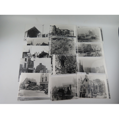 1712 - A collection of black and white reproduction photographs of bombing raids on Exeter showing  damage ... 