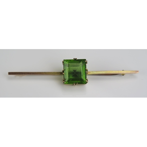 172 - A 9ct Gold and Green Stone Bar Brooch (70mm, 6.2g) and French? gold pendant (mark to back, 3.8g) and... 