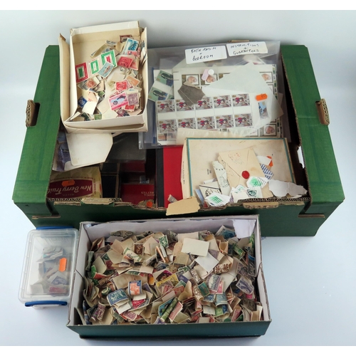 1724 - A large collection of British and world postage stamps all loose contained in boxes and tins.