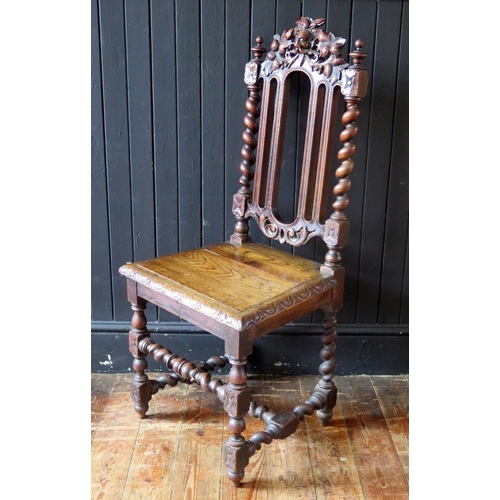 1779 - A Victorian oak hall chair in the Jacobean style, with arched carved top rail spiral twist back with... 