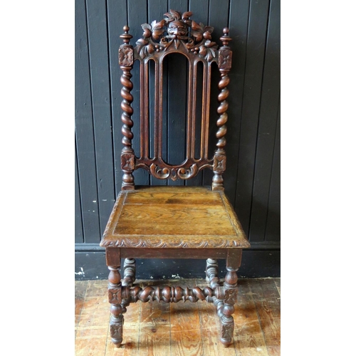 1779 - A Victorian oak hall chair in the Jacobean style, with arched carved top rail spiral twist back with... 