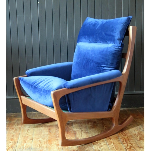 1782 - A Folke Ohlsson for Gimson & Slater a teak rocking chair, with refurbished upholstery.