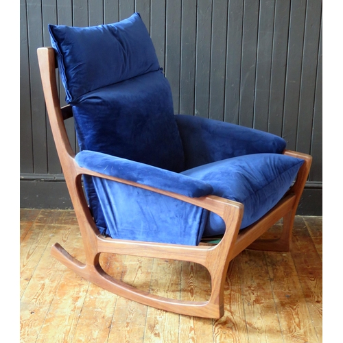 1782 - A Folke Ohlsson for Gimson & Slater a teak rocking chair, with refurbished upholstery.