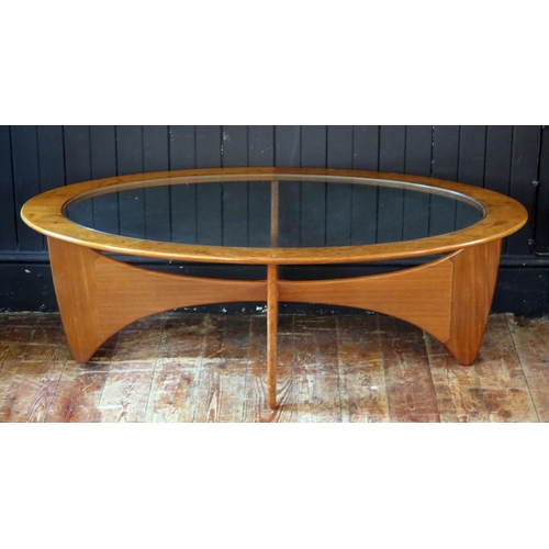 1787 - A 1970's G-Plan Astro oval teak coffee table, with inset glass top, 122cm long, together with a Nath... 