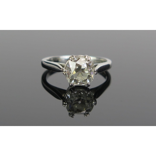 72 - A Platinum and Old Cut Diamond Solitaire Ring in a modern .950 setting, size L.25.  Sold with insura... 