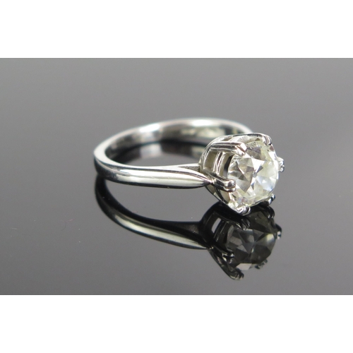 72 - A Platinum and Old Cut Diamond Solitaire Ring in a modern .950 setting, size L.25.  Sold with insura... 