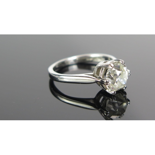 72 - A Platinum and Old Cut Diamond Solitaire Ring in a modern .950 setting, size L.25.  Sold with insura... 