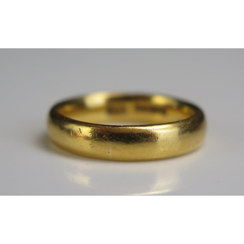 81 - A 22ct Gold Seamless Wedding Band, 4mm wide, size J, 5.4g