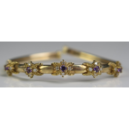 83 - A 9ct Gold, Amethyst and White Stone Torque Bangle, 8.7g