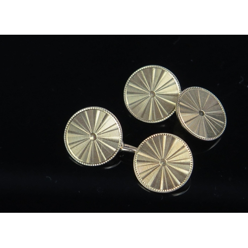 95 - A Pair of Early 20th Century 18ct Gold Shield Shape Cufflinks with engine turned decoration, 15mm di... 