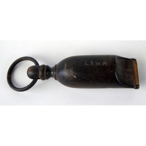 1585 - An L.S.W.R. Horn or Bone whistle, with loop suspension,